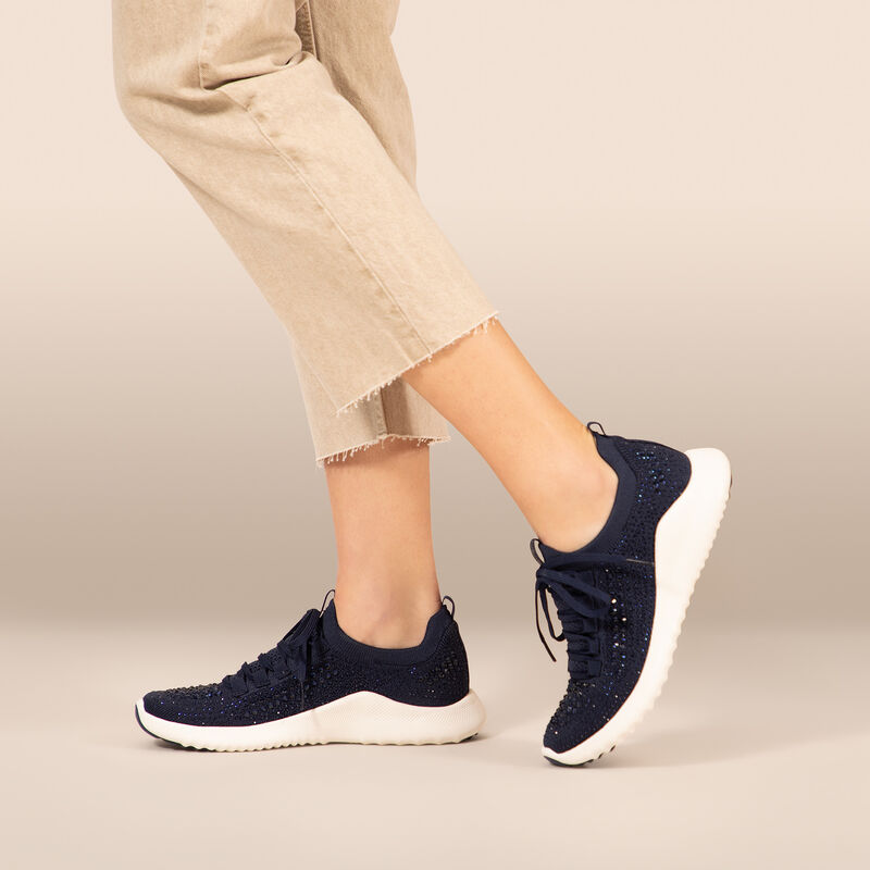 navy sparkle stretchy knit sneaker on foot